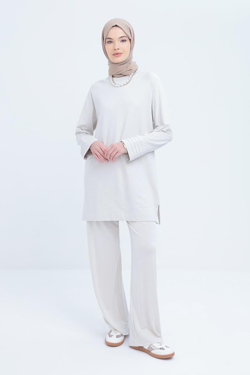 Tunic with Ribbed Cuff and Slit Detail