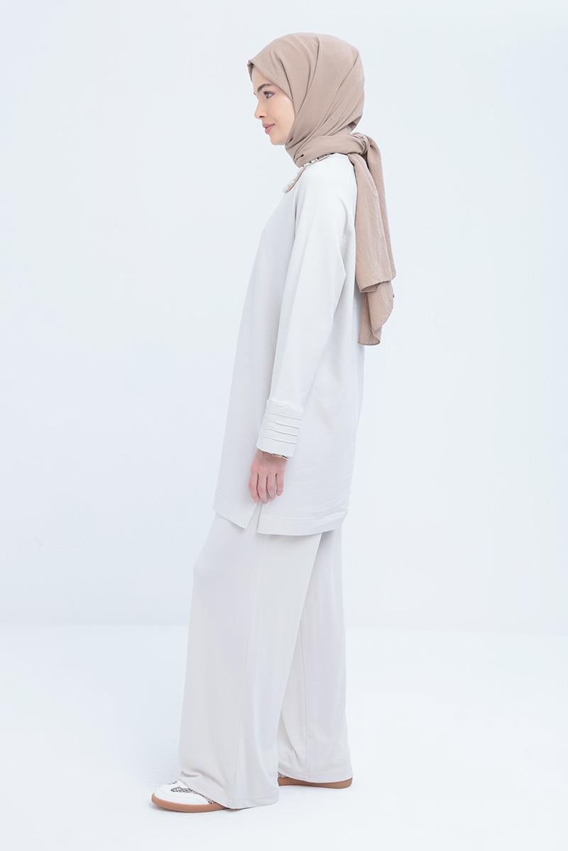 Tunic with Ribbed Cuff and Slit Detail