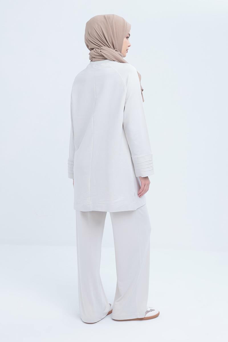 Tunic with Ribbed Cuff and Slit Detail